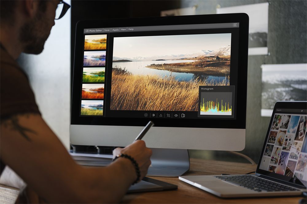 Creative professional editing images on a computer