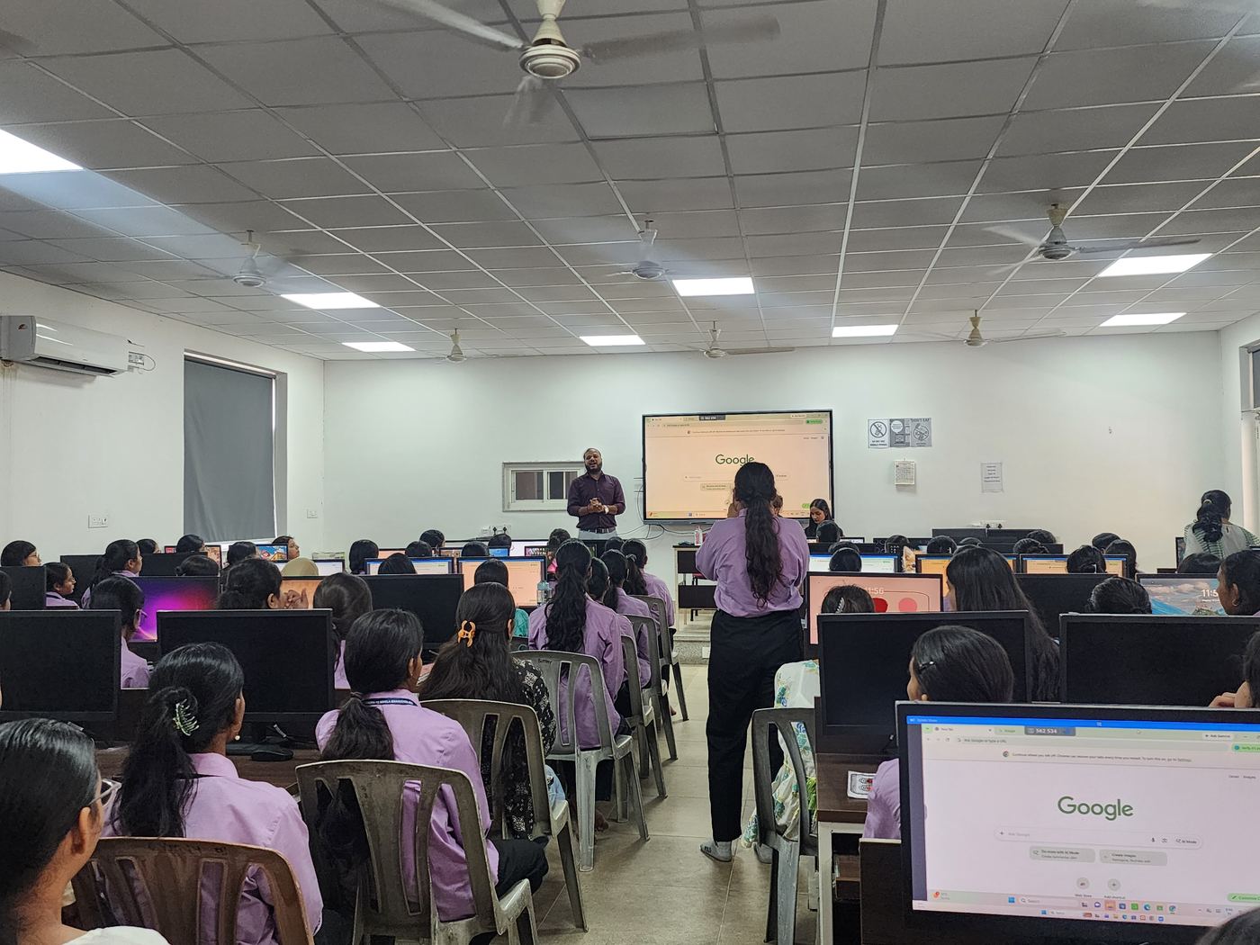 Students attend a computer lab session at Kanoria